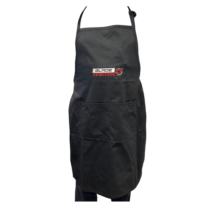 Black apron with Blademaster logo it